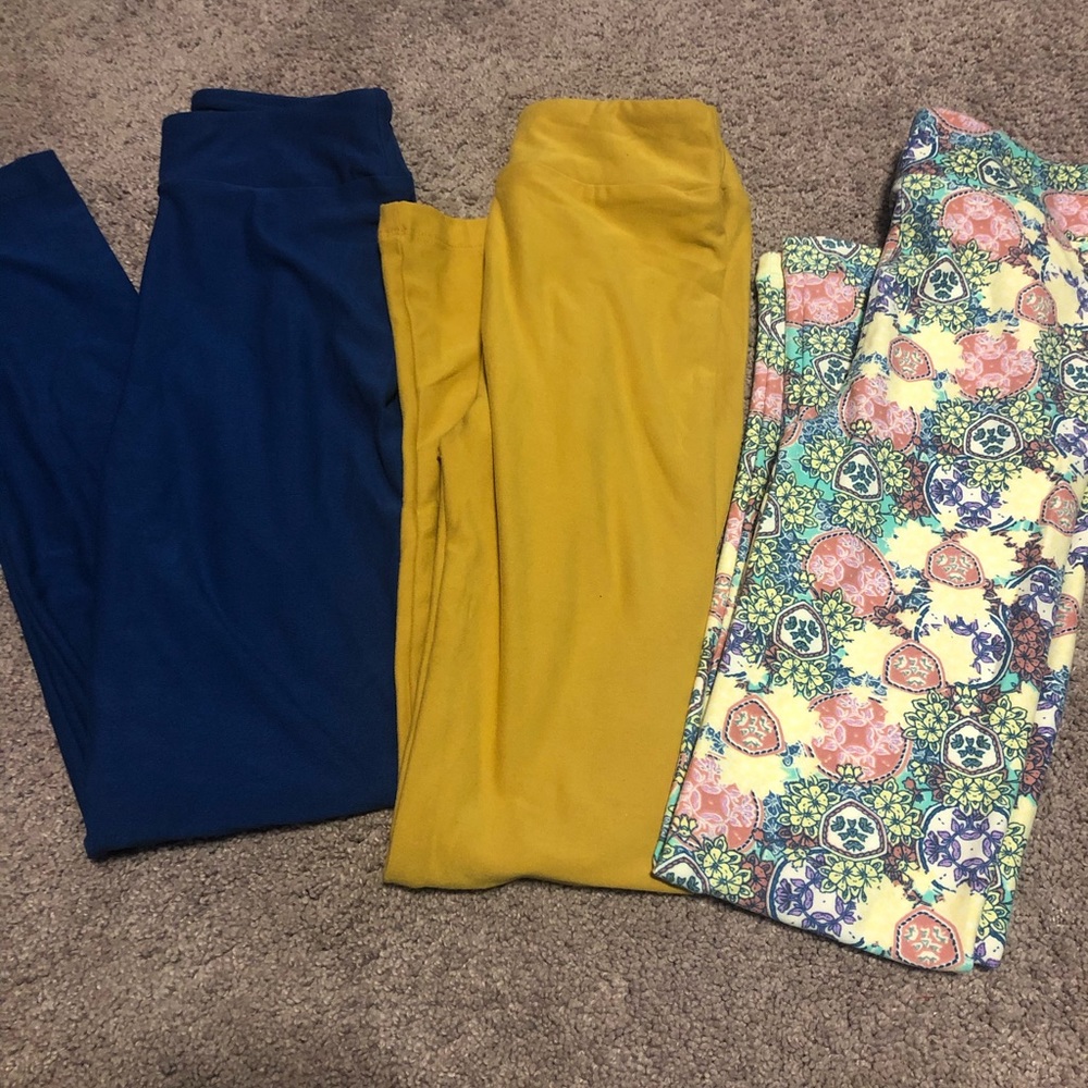 Three pairs of LuLaRoe kids leggings